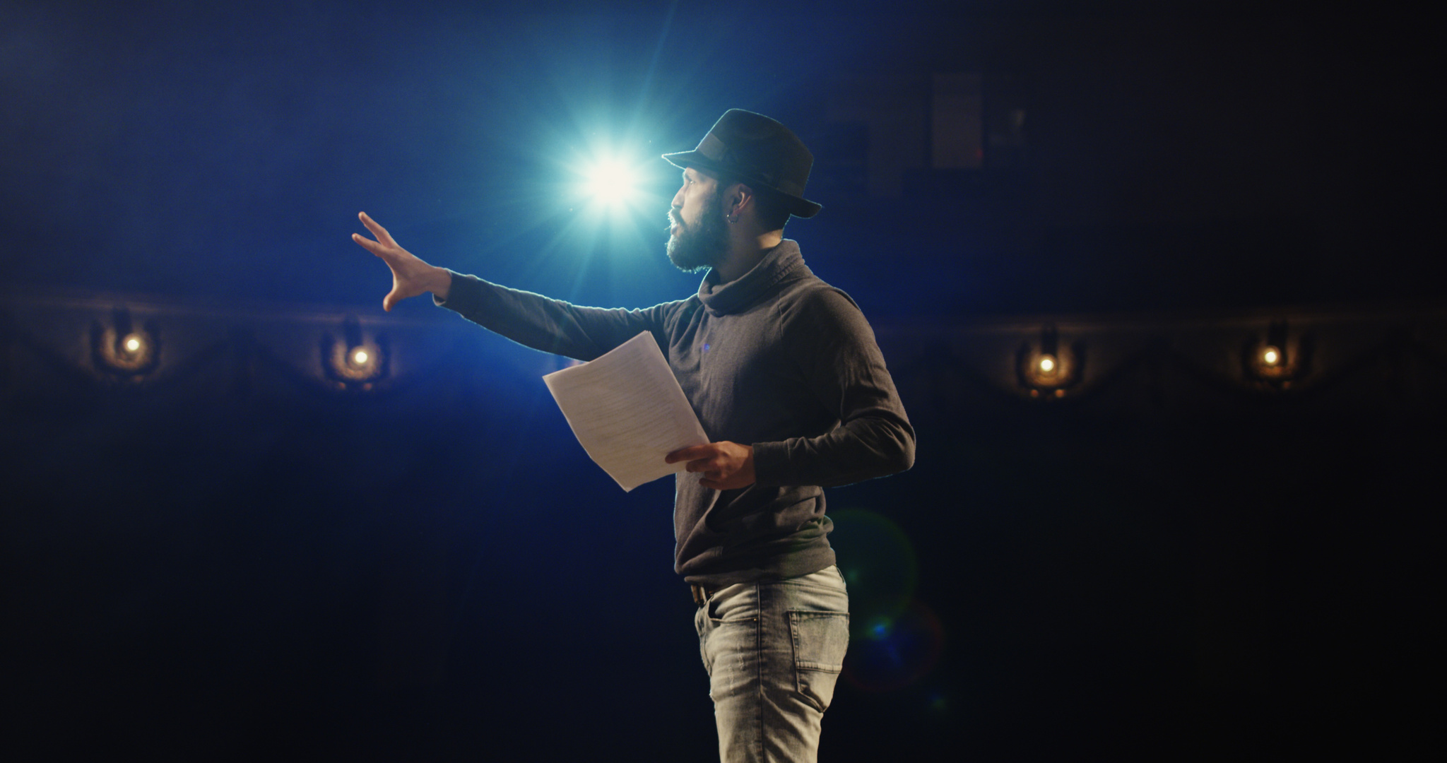 Actor performing a monologue in a theater